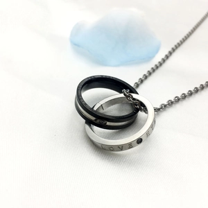 Double ring pendant necklace in black and silver stainless steel with love engraving