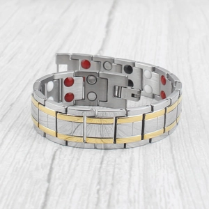 Men's magnetic therapy bracelet in gold and silver stainless steel with inset magnets