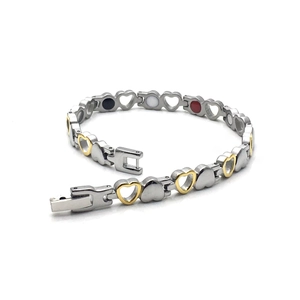 Magnetic therapy heart bracelet in stainless steel with silver and gold links