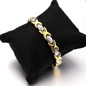 Polished gold and silver titanium steel magnetic bracelet with leaf and X pattern