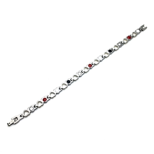 Close-up of heart-shaped stainless steel magnetic bracelet with colored mineral stone inlays