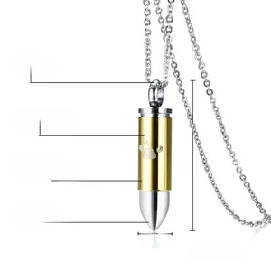 Detailed bullet pendant showing 35mm height, 8mm width and paw print engraving detail