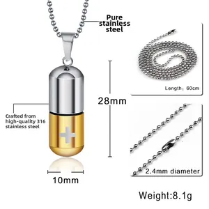 Vue macro du pendentif pilule en acier 316 avec dimensions 28x10mm et chaîne à billes