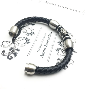 Braided black leather bracelet for men with Celtic knot steel beads and magnetic clasp