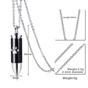 Bullet-shaped black stainless steel memorial pendant with white paw print and sizing