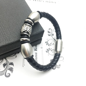 Braided black leather men's bracelet with engraved stainless steel beads and magnetic clasp