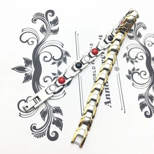 Polierte Magnettherapie-Armbänder aus Edelstahl in Silber und Gold zweifarbigem Design
