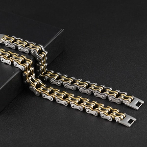 Industrial stainless steel motorcycle chain bracelet in two-tone gold and silver finish