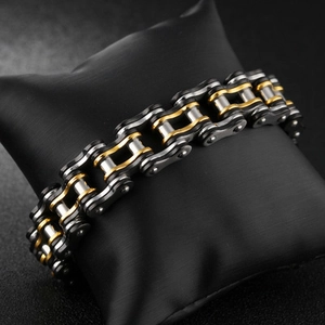 Three-tone stainless steel bike chain bracelet for men with black and gold link accents