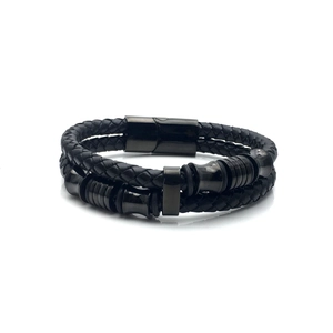 Detail view of double-layer black braided leather men's bracelet with magnetic metal clasp