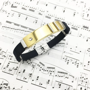 Men's two-tone stainless steel and black silicone bracelet with a sparkling zircon inlay