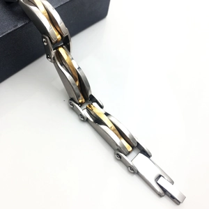 Two-tone gold and silver men's stainless steel bracelet with textured geometric links
