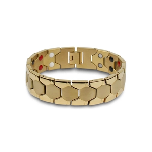 Detail of gold titanium magnetic therapy bracelet showing inner four-color energy stones