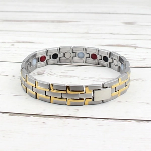 Men's magnetic health bracelet in silver and gold two-tone stainless steel finish