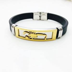 Men's fashion black silicone bracelet featuring a gold scorpion stainless steel clasp