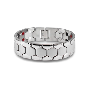 Detail of silver magnetic therapy bracelet with honeycomb links and inner wellness stones