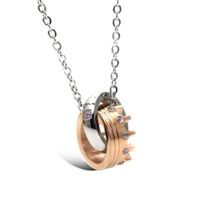Elegant interlocking crown ring pendant necklace with pink gem and rose gold finish