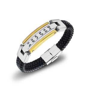 Detail of woven leather bracelet with dual-tone stainless steel zodiac charm and metal clasp