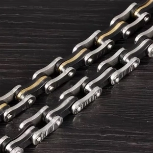 Industrial bicolor stainless steel bike chain bracelet for men with silver and gold accents