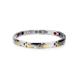 Detail view of gold and silver magnetic therapy bracelet with health stones inside