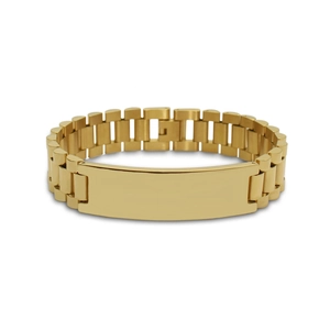 Detail shot of golden presidential style watch band bracelet with blank engravable plate