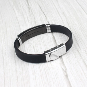 Men's stylish black silicone bracelet with silver stainless steel fold-over clasp details