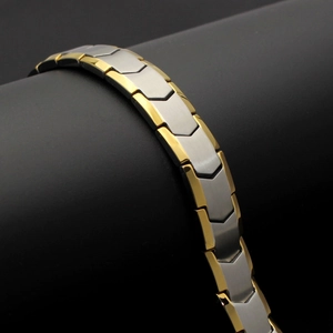 Men's fishbone pattern bracelet in gold and silver steel with magnetic health benefits