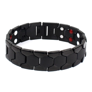 Men's titanium steel magnetic health bracelet with black hexagonal links and therapy dots