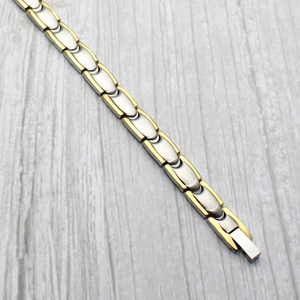 Two-tone gold and silver wavy link titanium steel magnetic bracelet for men and women