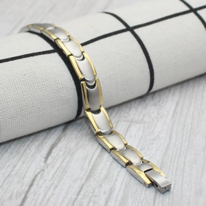 Two-tone silver and gold wavy bullet titanium steel magnetic bracelet for men and women