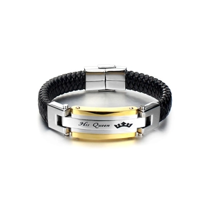 Detail of His Queen crown engraving on a black braided leather bracelet with gold accents