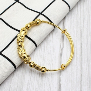Traditional Chinese adjustable gold bracelet featuring auspicious dual PiXiu charms