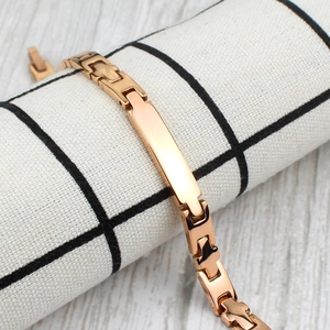 Bracelet magnétique or rose pour femme avec plaque d'identification en métal poli