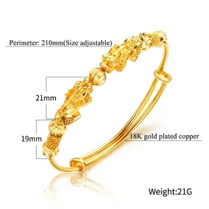 18K gold plated copper bracelet with dual dragon heads and a central bead design