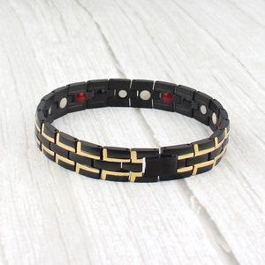 Men's titanium steel magnetic therapy bracelet with black and gold link design