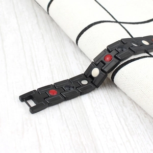 Men's titanium magnetic energy bracelet with black matte finish and four-in-one stones