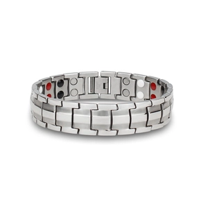 Macro view of 15mm stainless steel magnetic therapy bracelet with inset health stones