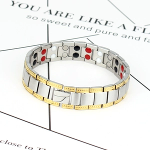 Men's magnetic therapy bracelet in silver and gold stainless steel with energy beads