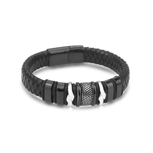 Close-up of black braided leather bracelet for men with textured silver metal beads