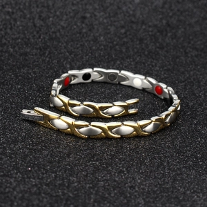 Titanium magnetic therapy bracelet with two-tone silver and gold steel links