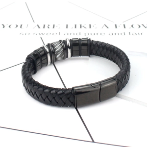 Men's woven black leather bracelet with textured metal beads and magnetic clasp
