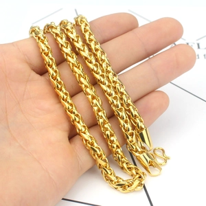 Heavy 24K gold plated Spiga wheat chain necklace with S-hook clasp held in hand