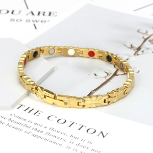 Bracciale magnetico da donna in titanio placcato oro 18k con maglie metalliche a trama