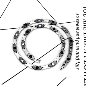 Polished magnetic ceramic necklace in black and silver with sleek stainless steel links