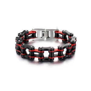Detail of red and black stainless steel motorcycle chain bracelet with folding clasp