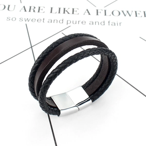 Three-layer braided leather bracelet with black and brown cords and silver magnetic clasp
