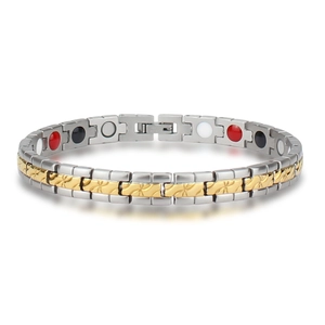 Zweifarbiges Magnettherapie-Armband aus Edelstahl mit Goldakzenten und Reliefgliedern