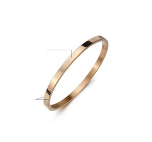 Detail of 4mm rose gold titanium bangle showing vacuum plating and polished finish