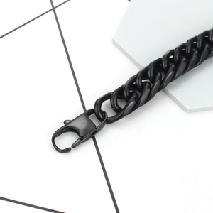 Bold matte black stainless steel Cuban link bracelet with a secure lobster clasp closure