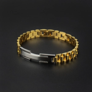 Close-up of golden watch-style chain bracelet with brushed silver stainless steel plate
